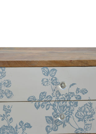 Blaues Nachttischchen mit Blumenmuster