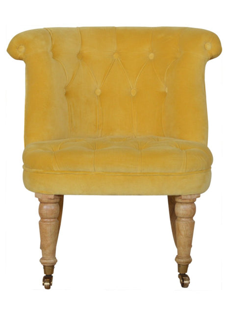 Silla decorativa de terciopelo mostaza